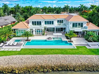 Waterfront estate on 860 Admiralty with an infinity pool and lawn to the seawall